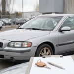 How to Negotiate a Used Car Price Using Its History Report
